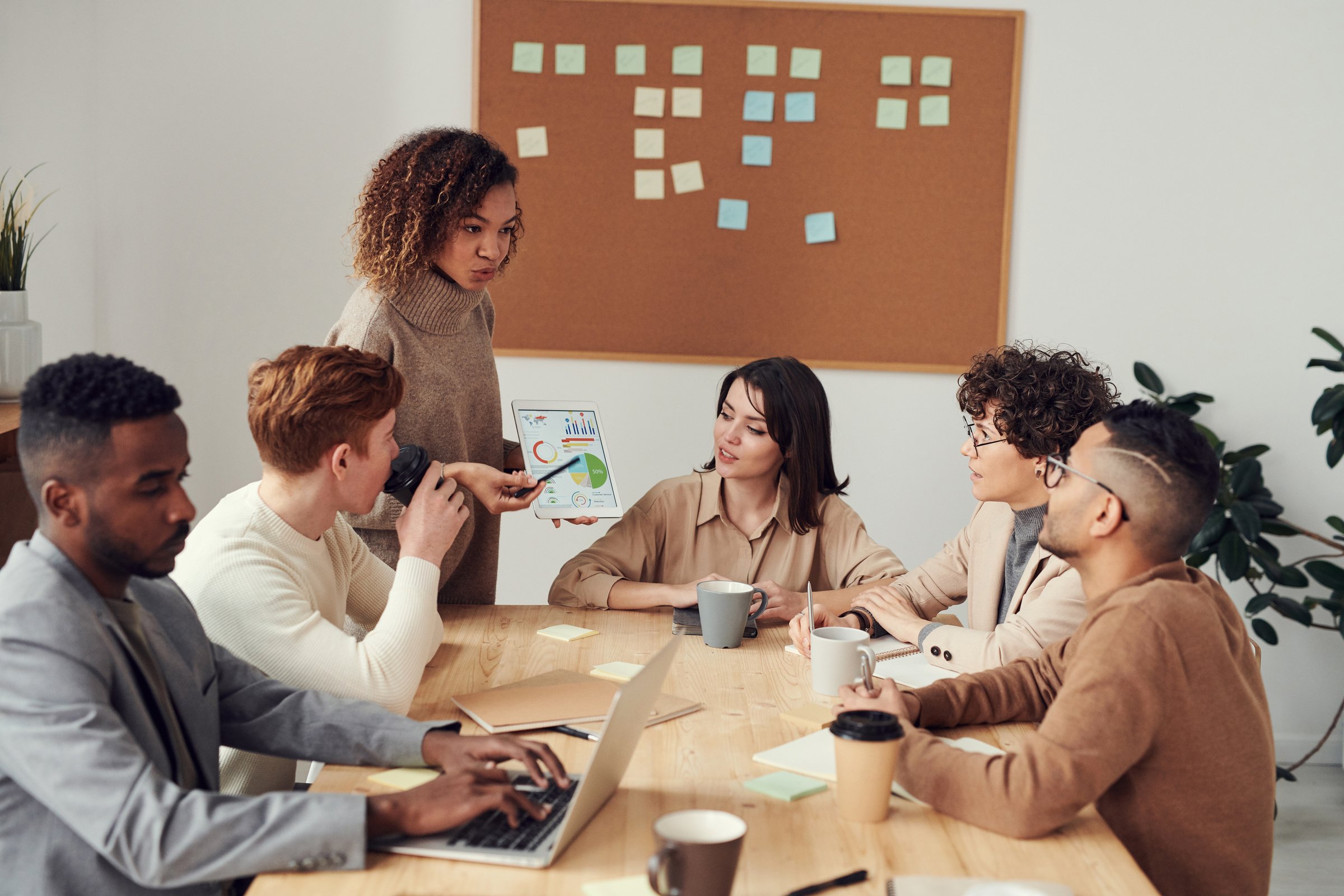 Diverse group of young professionals collaborating in the office