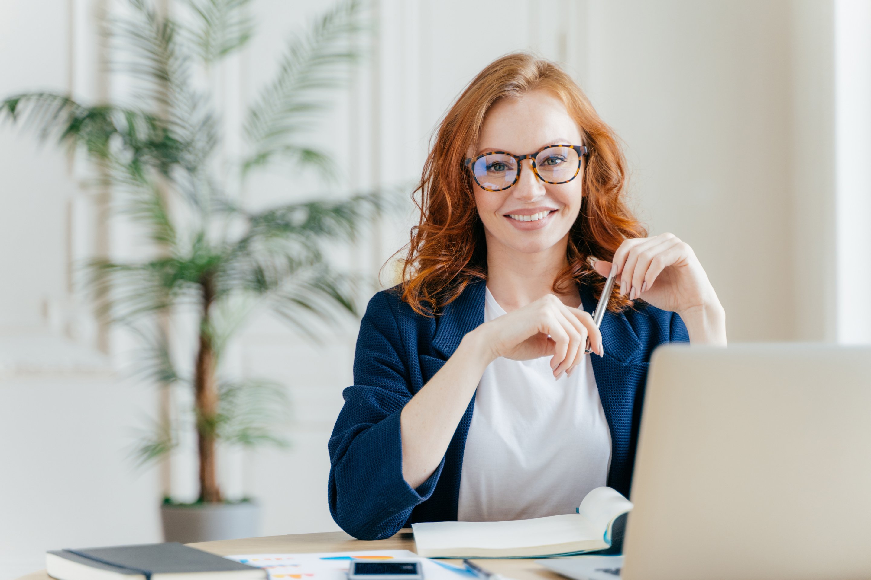 Happy redhair women employee